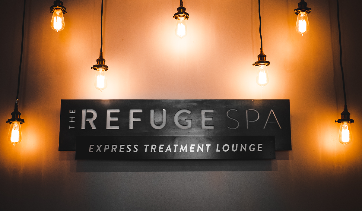 Photo of the Refuge spa signage